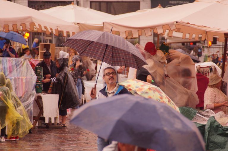 Adult man with umbrella