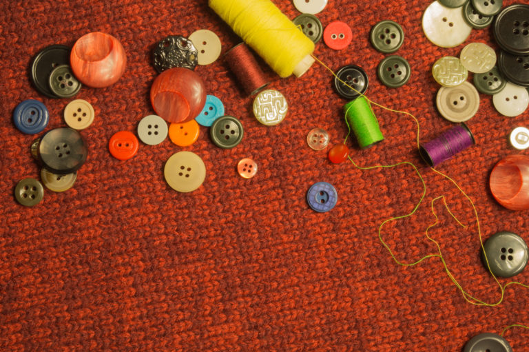 Various sewing buttons with the threads