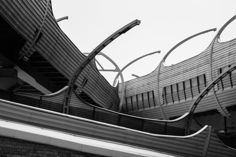 Architecture lines under the bridge. Speedway black and white